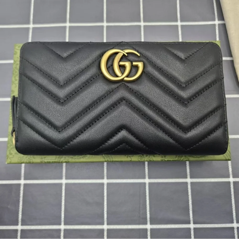 Gucci Black Wallet with Gold Logo